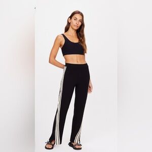 The Upside Black Track Pants THE ORIGINAL PETRA FLARE with White Stripes-Size M